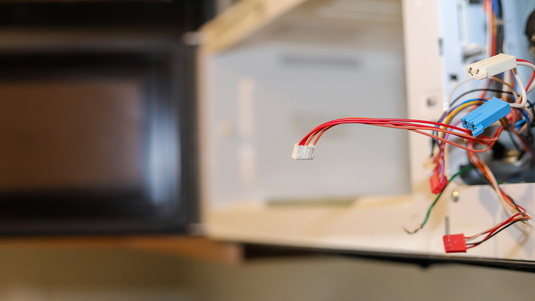 Broken Microwave with Wires